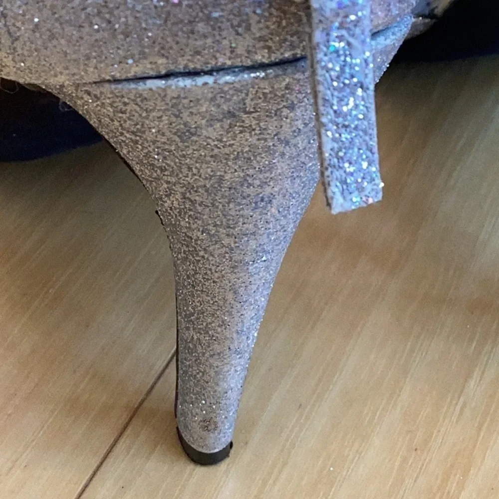 Nina silver glittery, strappy high heels, zipper to back. Women’s size 7